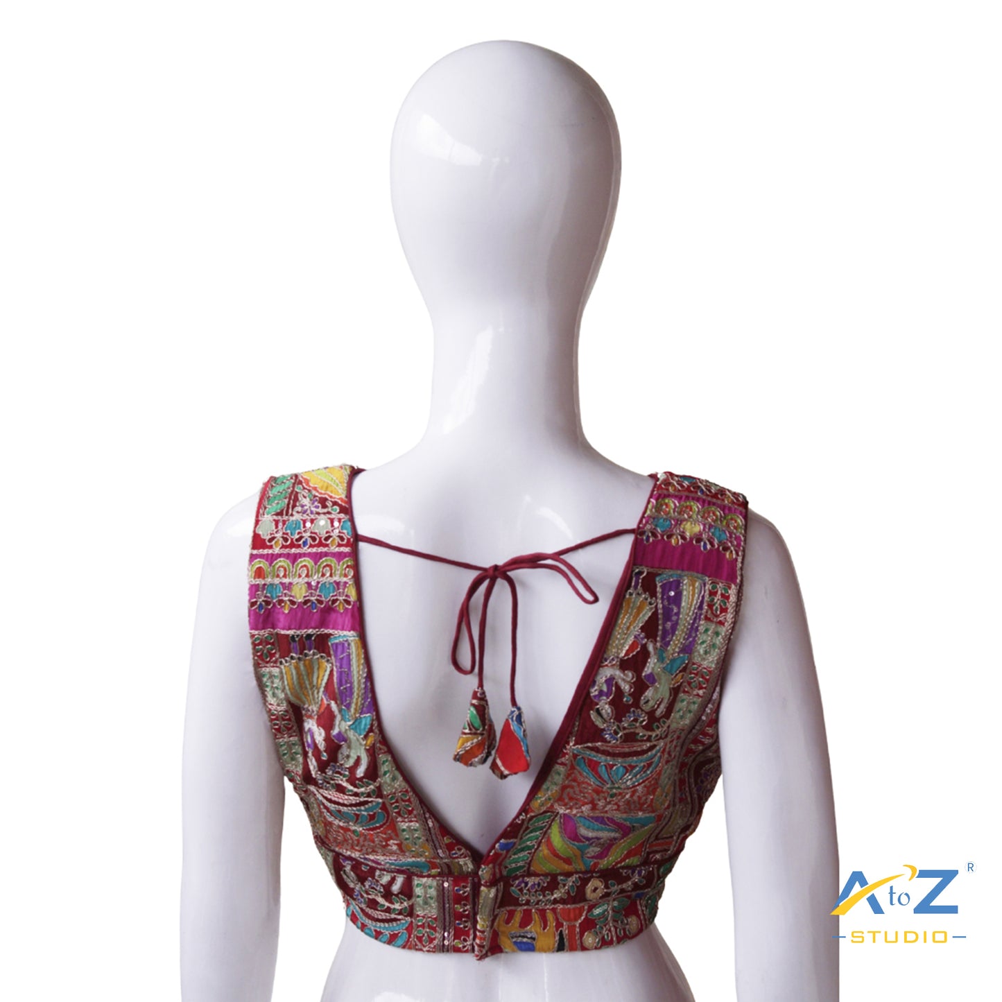 Vibrant Maroon Patchwork Blouse with Intricate Threadwork and Mirror Embellishments
