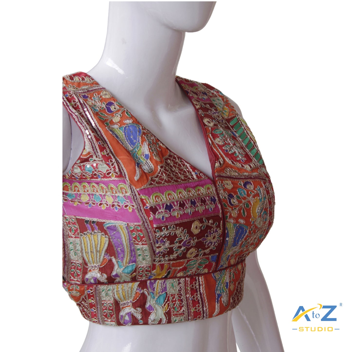 Vibrant Maroon Patchwork Blouse with Intricate Threadwork and Mirror Embellishments