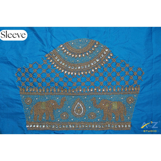 Blue Elephant Motif Maggam Work Blouse Sleeve Design – A Royal Choice for Bridal and Festive Wear