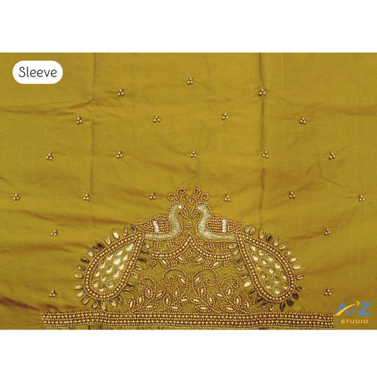 Mustard Yellow Maggam Work Blouse Sleeve with Twin Peacock Embroidery – Perfect Bridal Blouse Design