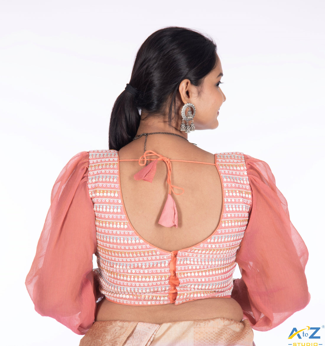 Why Every Wardrobe Needs a Statement Blouse