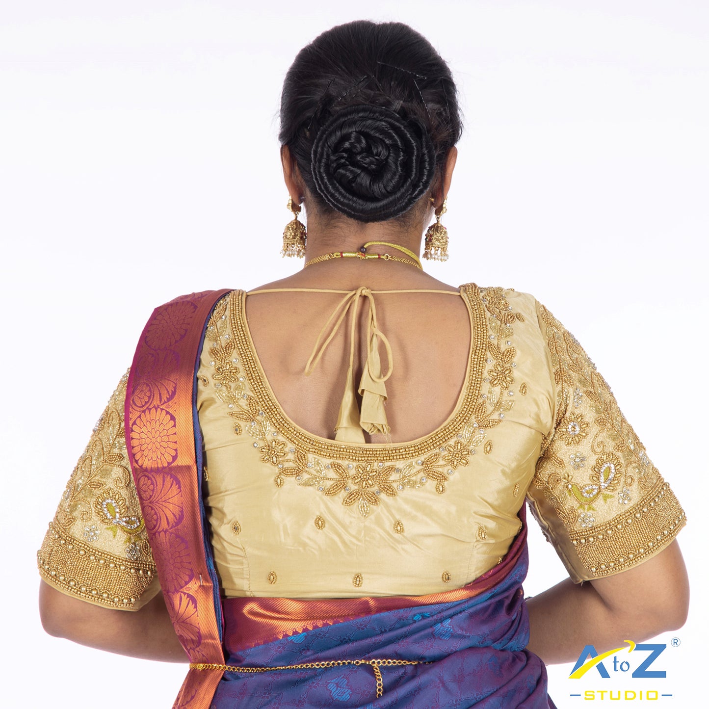 Ivory with silver work Blouse with Pearl,leaf and flower mixed Design