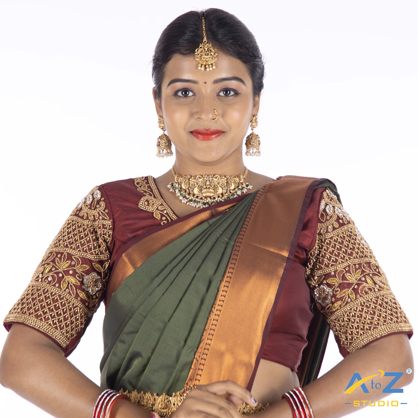 Maroon Silk Cloth Blouse with Rangoli design Design