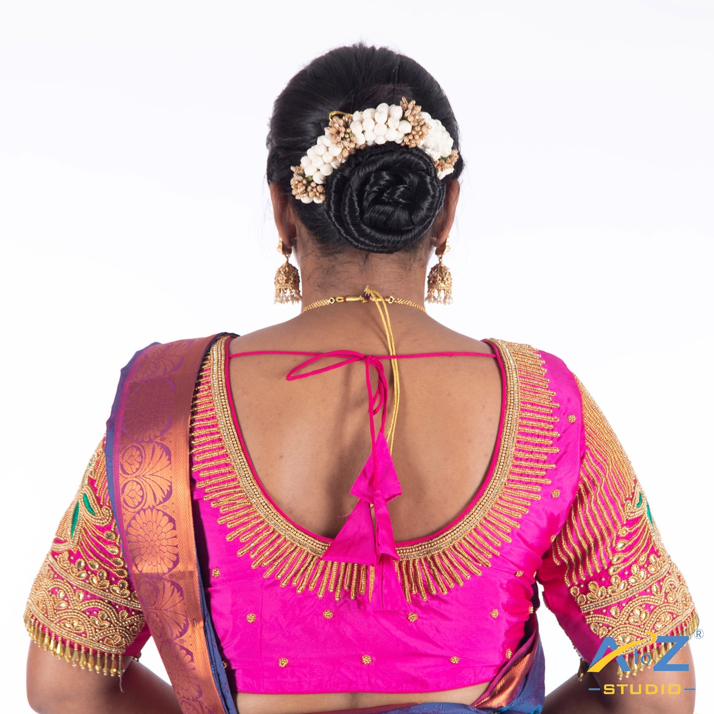 Bright Pink Silk Cloth Blouse with Small peacock double and chain and beeds Design