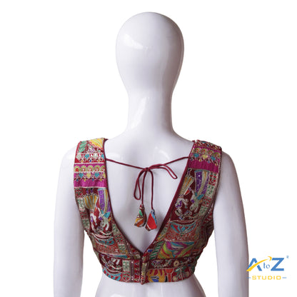 Vibrant Maroon Patchwork Blouse with Intricate Threadwork and Mirror Embellishments